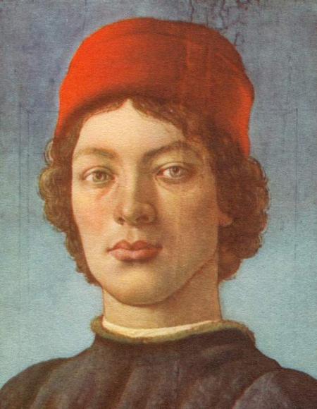 Portrait of a young man with red cap 